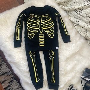 Baby gap Halloween skeleton pajamas.
